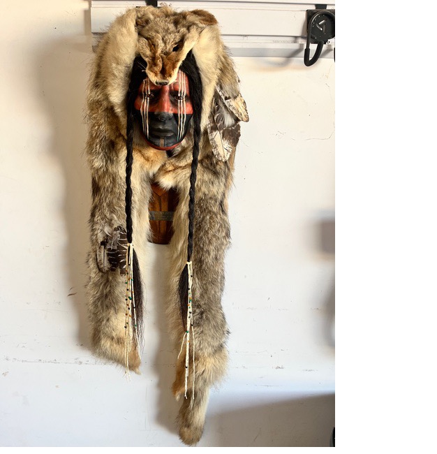 A statue of a person in a fur coat
AI-generated content may be incorrect.